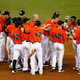Miami Marlins celebrate victory Sunday on Jackie Robinson Day. (Mike Ehrmann/Getty Images)